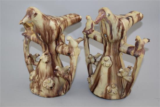 Two Yorkshire glazed red pottery figural bird whistles, second half 19th century, 25cm, restorations